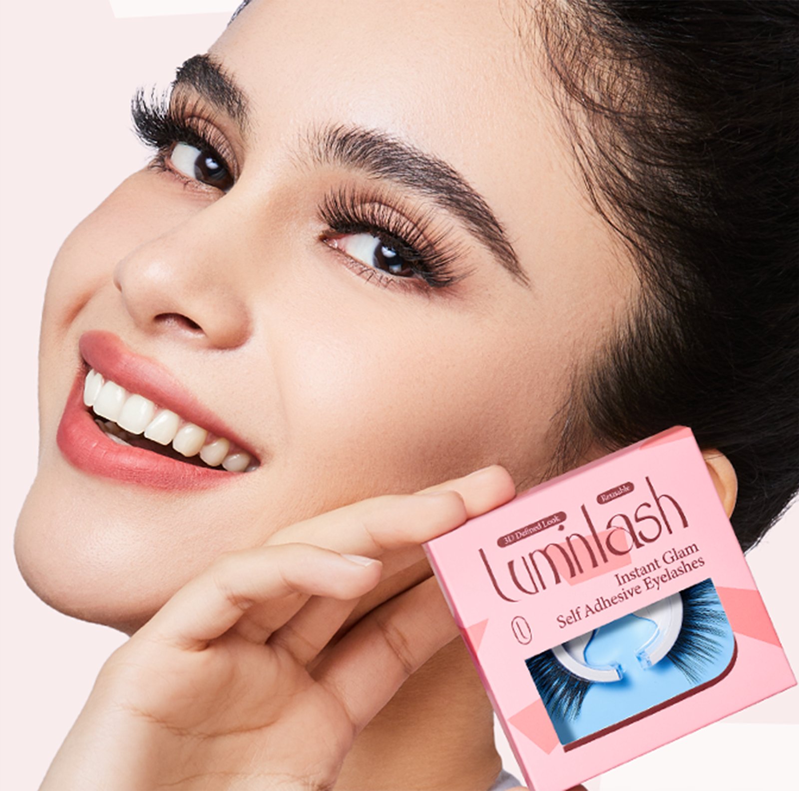 Model holding a Luminlash lash box