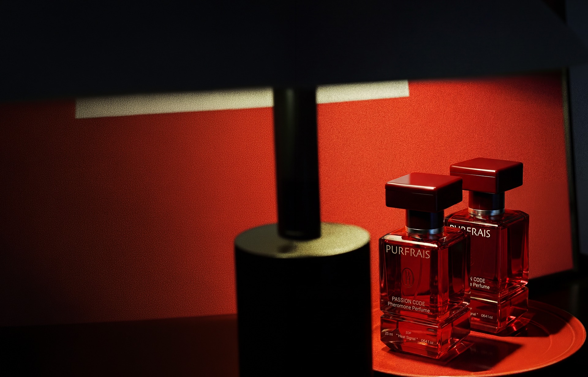 PURFRAIS Passion Code bottles in red light